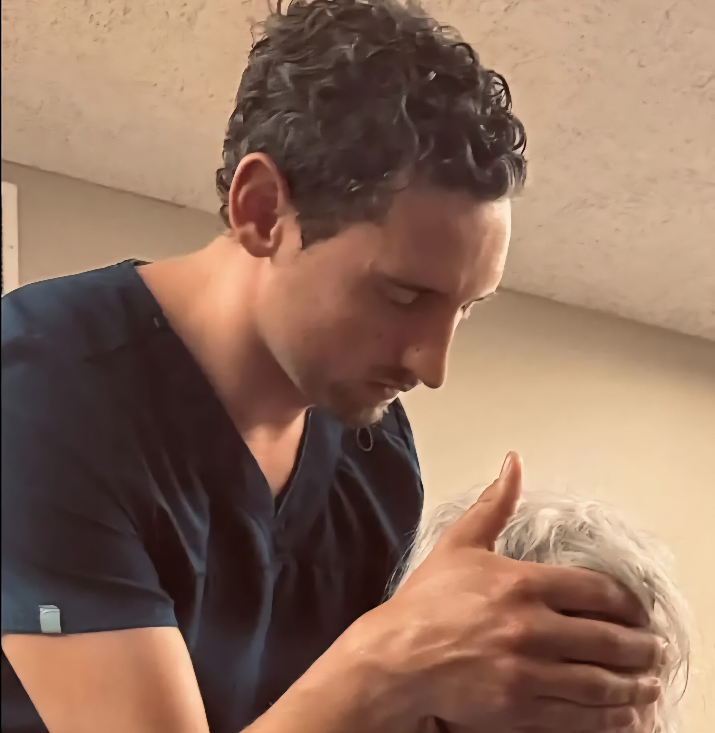 Steven Friesen providing hands-on treatment
